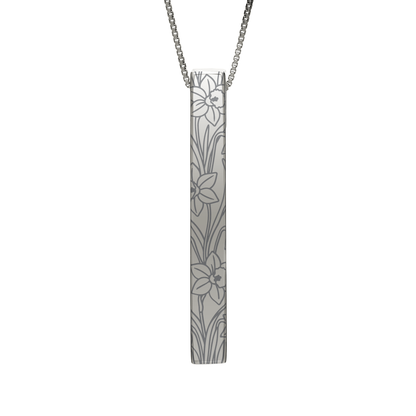 March Daffodil necklace in stainless steel, daffodil pattern front view