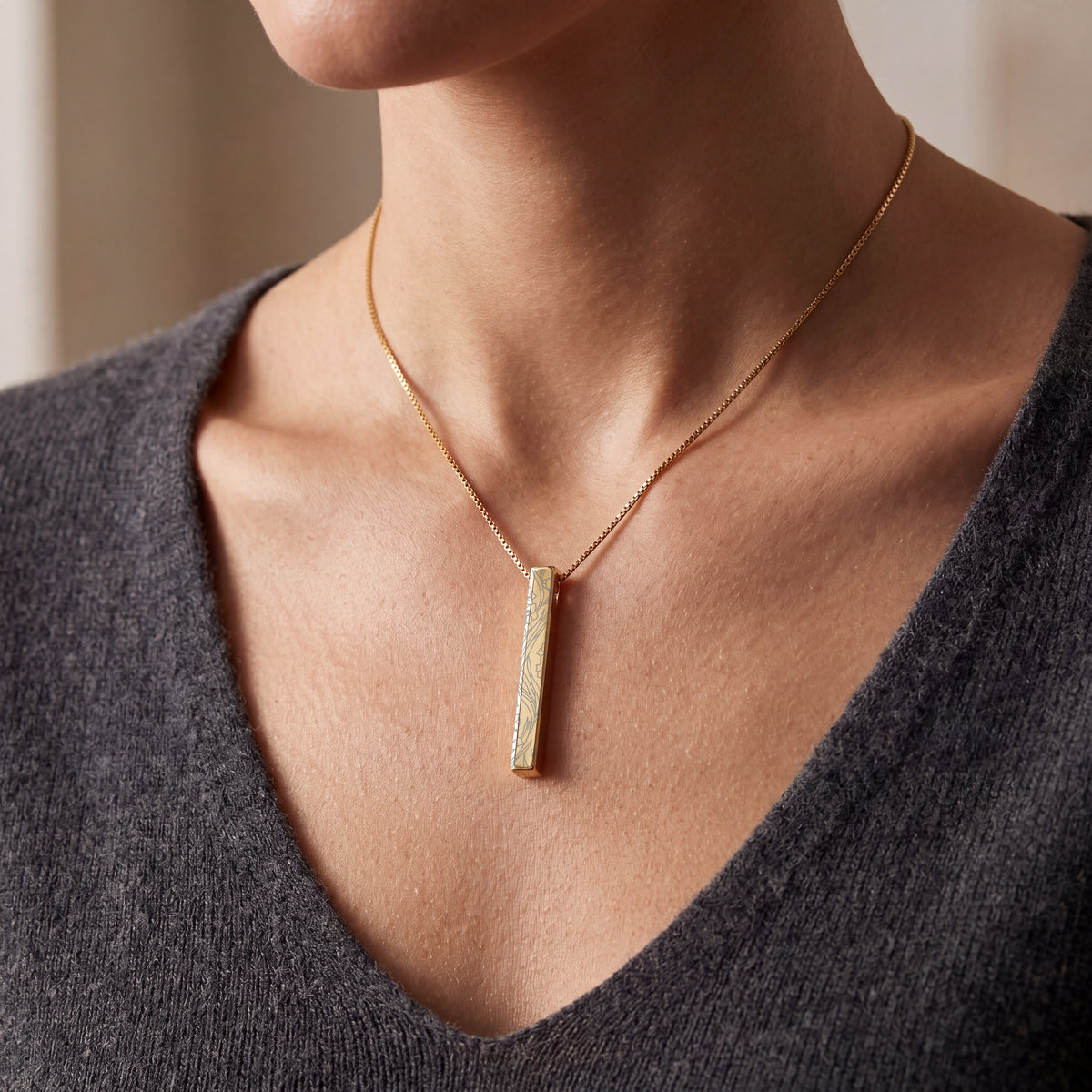Model wearing the August Gladiolus birth flower necklace in 14K gold plated