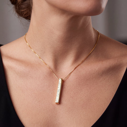 Model wearing the February Violet birth flower necklace in 14K gold plated