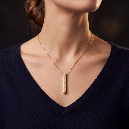 Model wearing the June Rose birth flower necklace in 14K gold plated