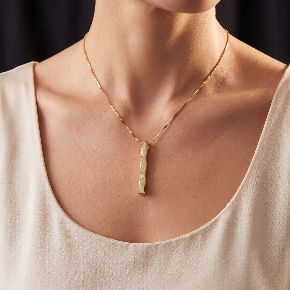 Model wearing the November Chrysanthemum birth flower necklace in 14K gold plated