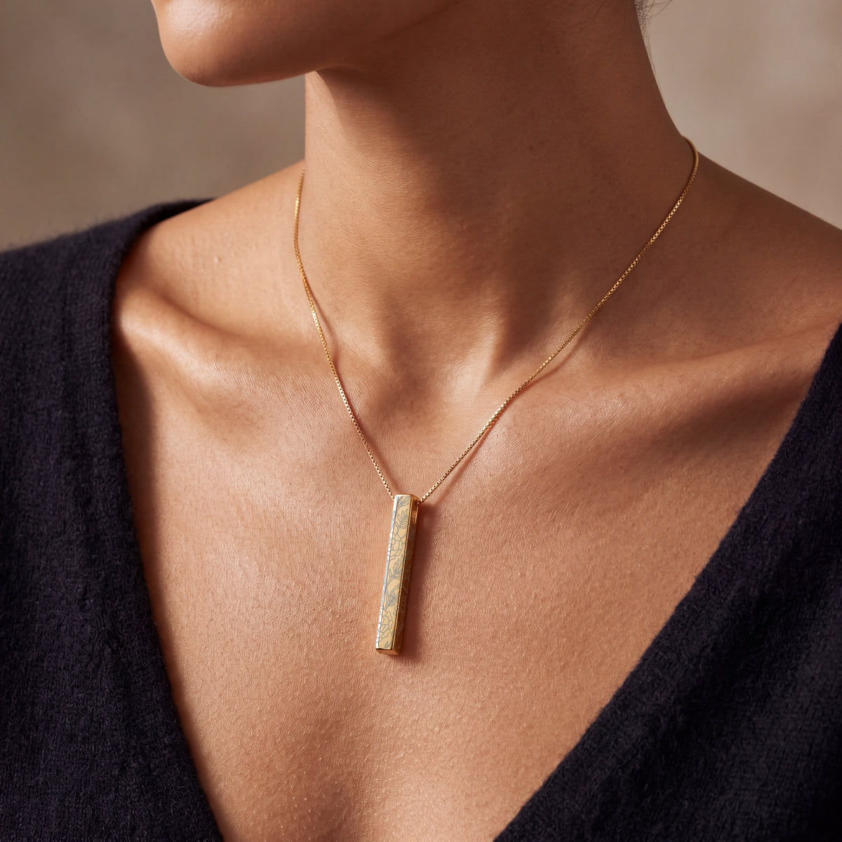 Model wearing the October Marigold birth flower necklace in 14K gold plated